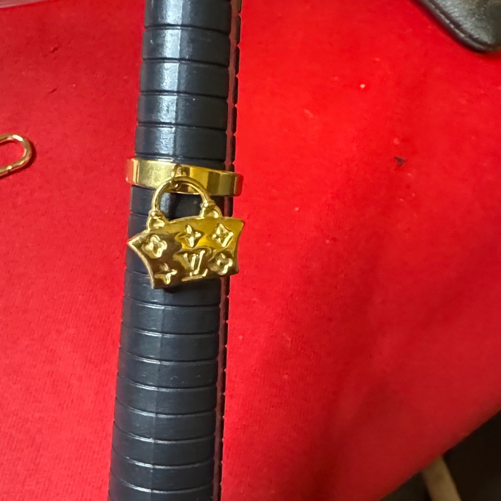 18k Gold plated stainless steel Ring with Designer Charm adjustable size 7and up